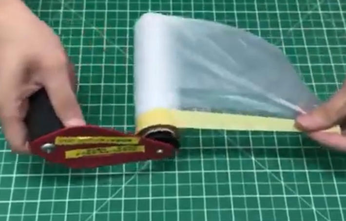 Masking film unwinding fixture