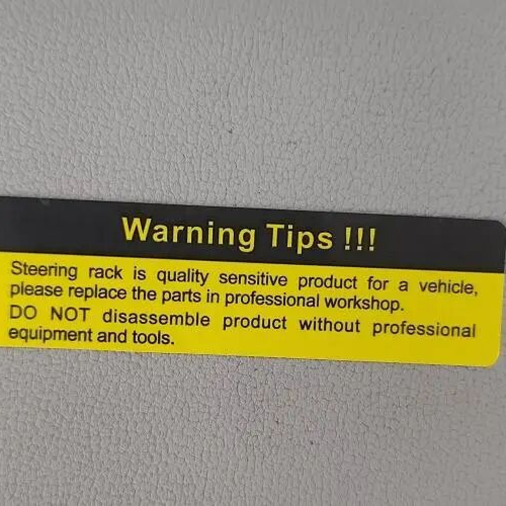 Warning label for automotive wireless charger cover plates