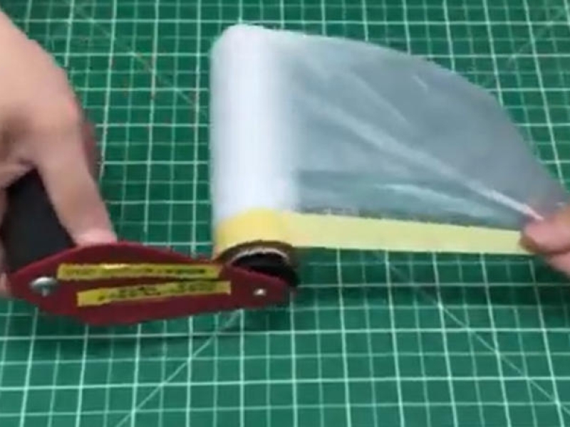 Masking film unwinding fixture